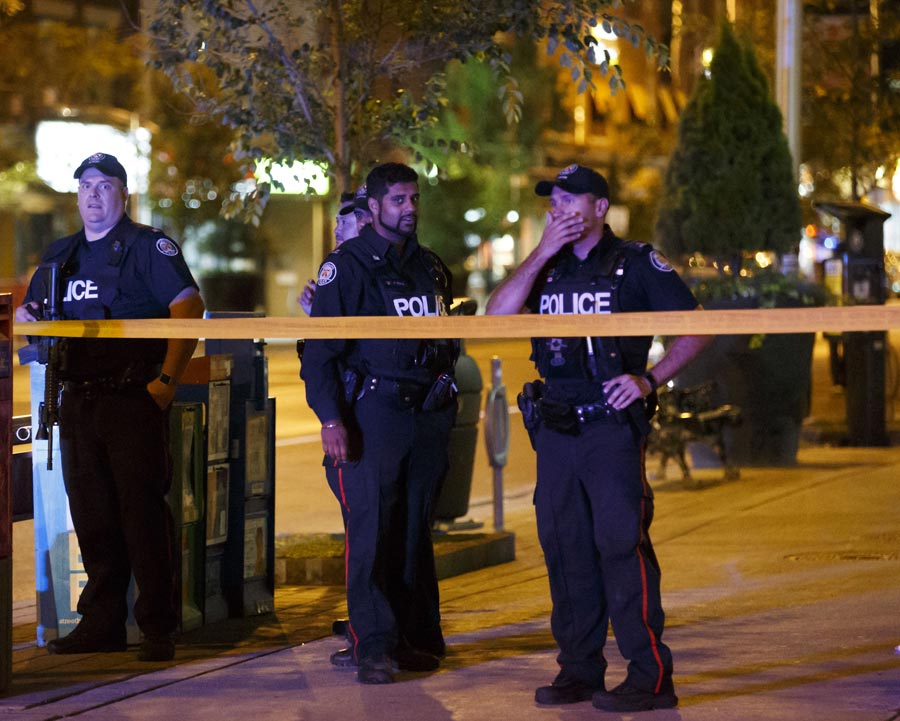 police officers standby after Greektown shooting