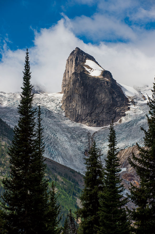 A mountain appearing through a blanket of ice on the horizon.