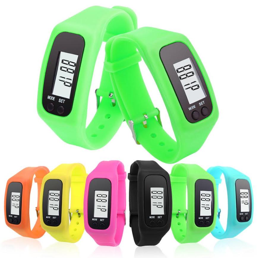 A row of activity trackers in bright green, orange, pink black and blue.