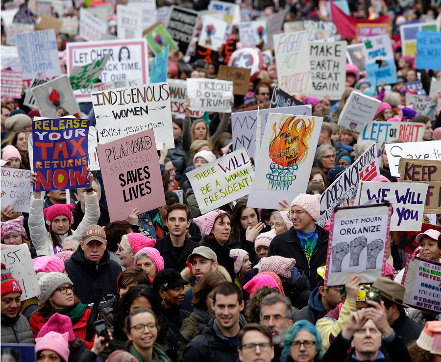 Demonstrators protest during the Women&#039;s March along Pennsylvania Avenue January 21, 2017 in Washington, DC.