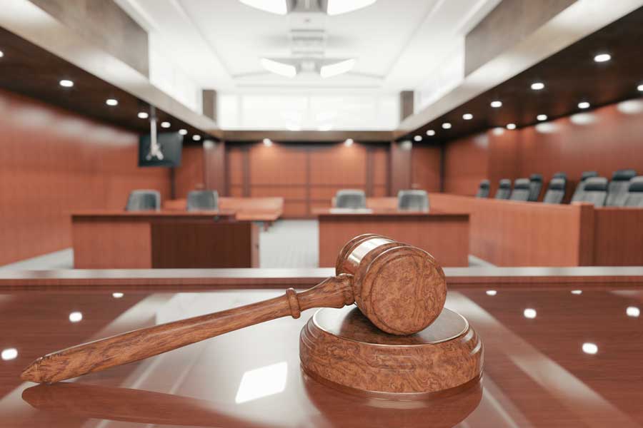 A wooden gavel in a courtroom.