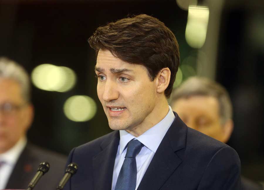 Prime Minister Justin Trudeau addresses the SNC Lavlin scandal during a transit funding announcement at the Winnipeg Transit bus barn, Tuesday, February 12, 2019.