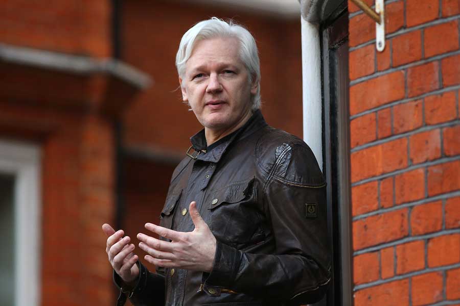 Julian Assange speaks to the media from the balcony of the Embassy Of Ecuador on May 19, 2017 in London, England.