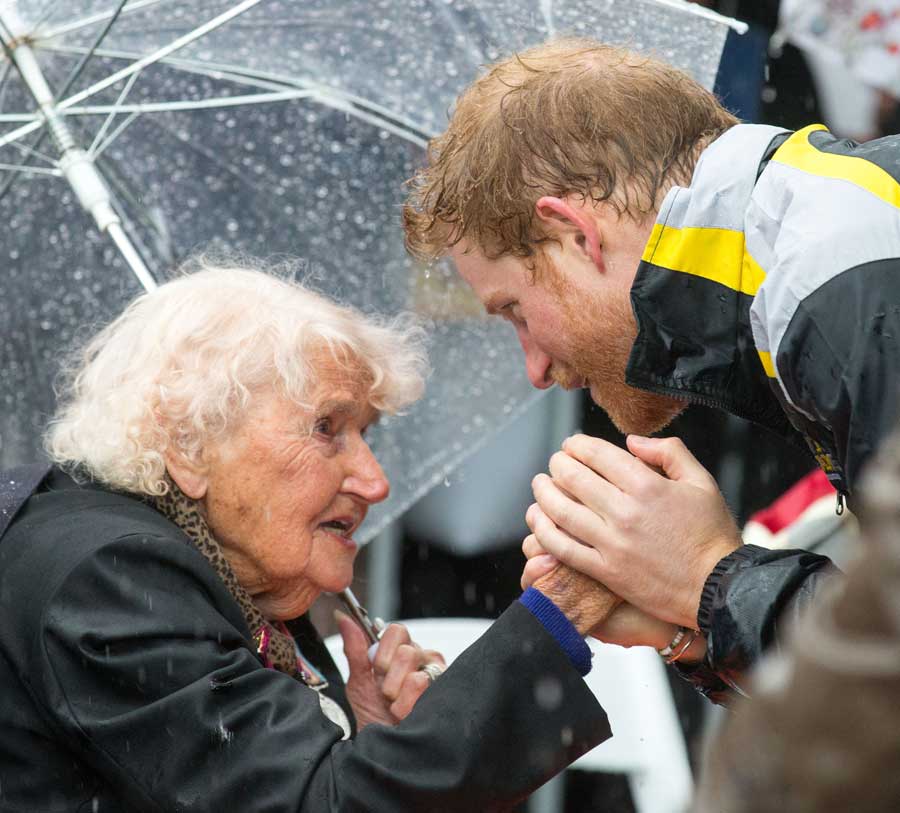 Prince Harry meets Daphne Dunne on a walkabout on Circular Quay in Sydney, Australia, during a day of events to mark the official launch of the Invictus Games Sydney 2018