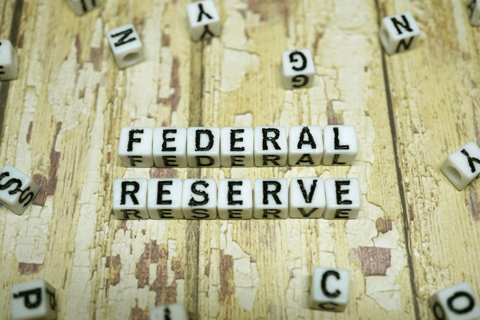 Puzzle pieces spelling out Federal Reserve