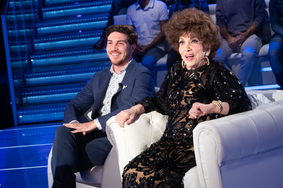 Gina Lollobrigida and Andrea Piazzolla attend 'Domenica In' TV show at the Studio RAI Fabrizio Frizzi in Rome, Italy, on October 7, 2018.