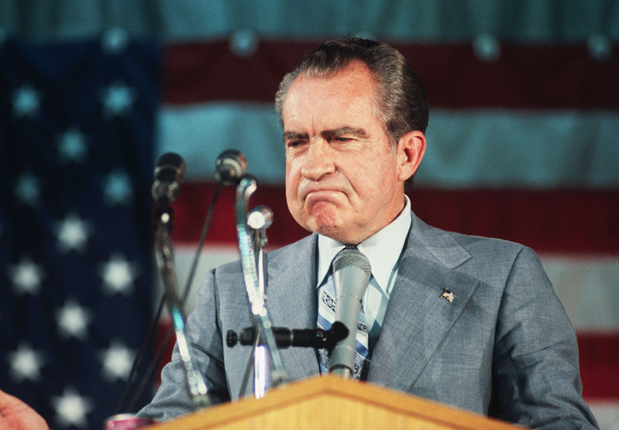 Former president Richard Nixon frowns as he addresses supporters in his first appearance after resigning from Presidency.