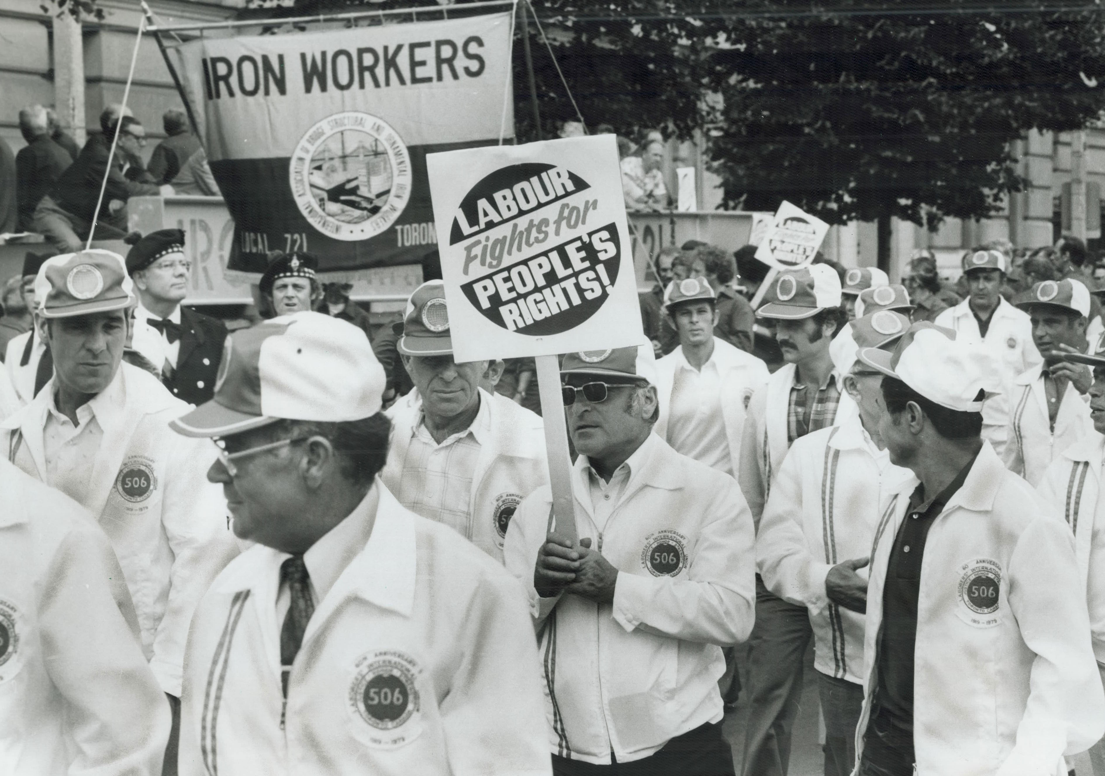 Labor day parade: Since 1886; Ontario workers have celebrated their day by marching together. In this 1979 photo; union members are shown attacking the provincial government's planned spending cutbacks.