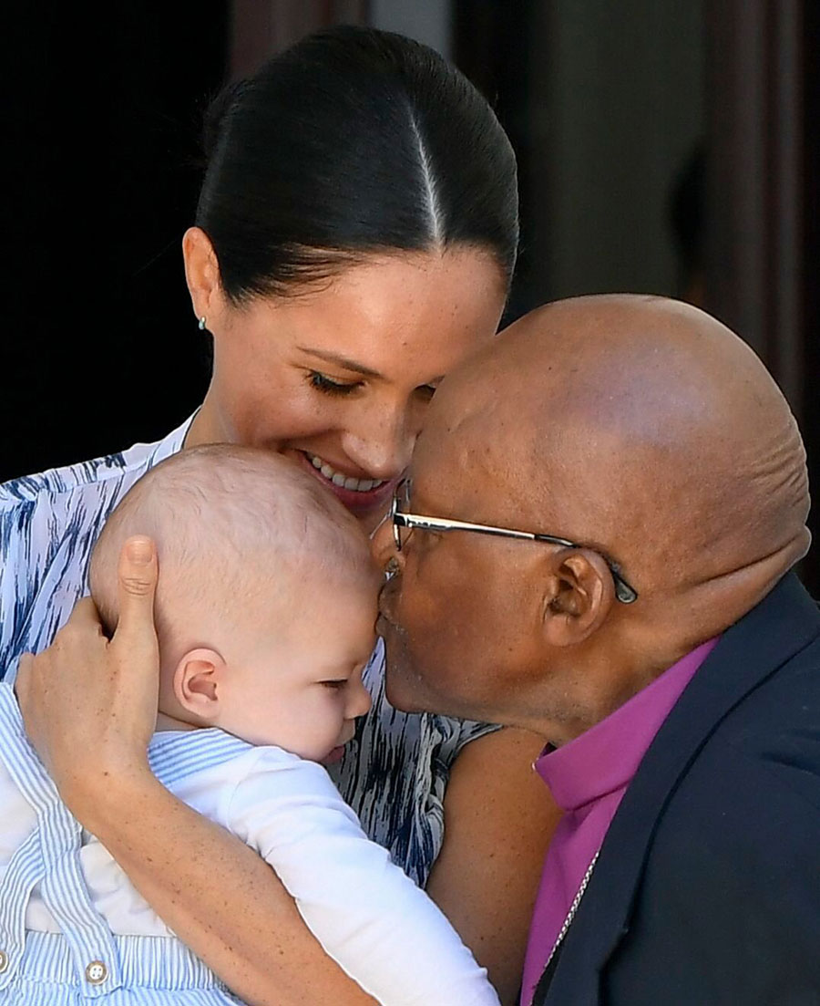 Meghan Duchess of Sussex, holding her son Archie Harrison Mountbatten-Windsor, meets Archbishop Desmond Tutu at the Desmond &amp; Leah Tutu Legacy Foundation in Cape Town, South Africa. Photo: Shutterstock