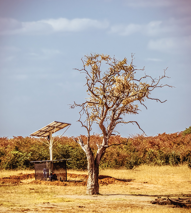 A solar-powered water well.