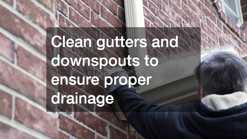 Clean gutters and downspouts to ensure proper drainage