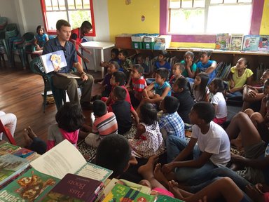 Group reading at the library during Saturday Storytime. We’ve crafted short story books after reading hour in the past.