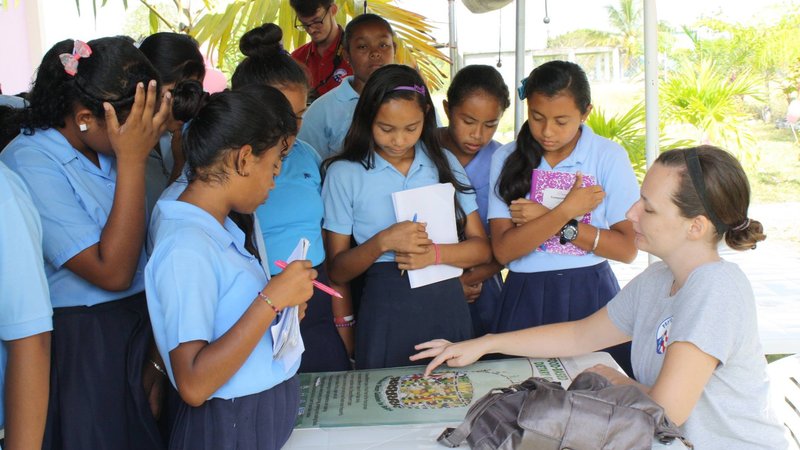 Jessica teaching school children