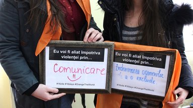 1. Two girls at a workshop in Criuleni describe how they plan to be “an ally against violence.” (Photo credit: Rebecca Lehman