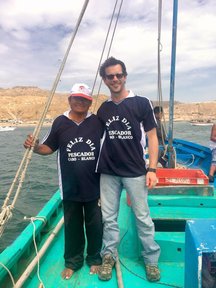 Peace Corps Response volunteer Christopher Giordano with Mercedes Tume, local fisherman.