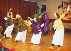Performing african dance at Kwanzaa celebration