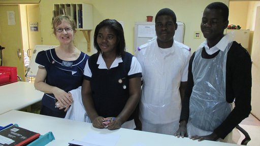 Laurel with a qualified nurse and two student on the male surgical ward