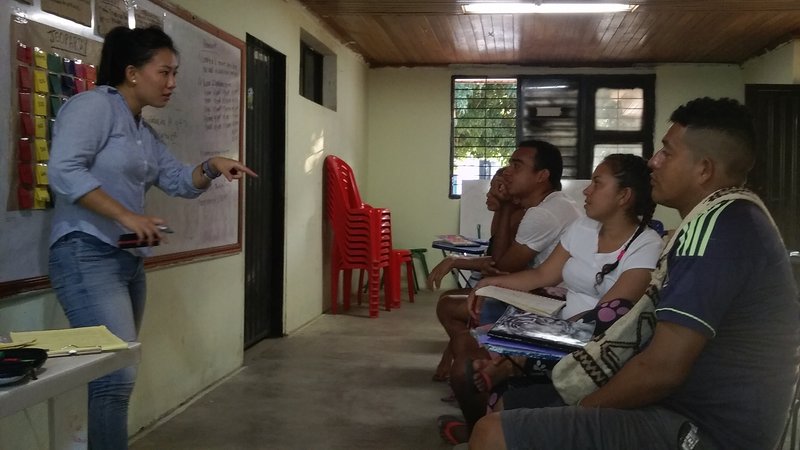 PCV Angell Kim teaching English to a group of tourist guides