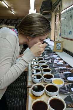 Kait tasting coffee in Kenya