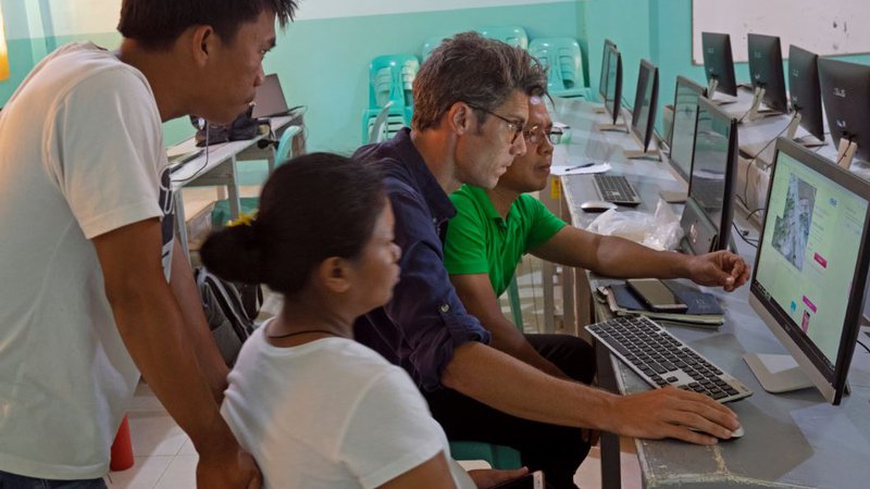 Peace Corps Response Volunteer Charles Reilly worked on a land use map to reflect the diversity of land and potential resourc