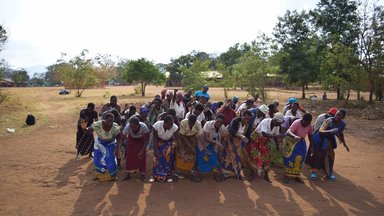 Choir group rehearsing and dancing