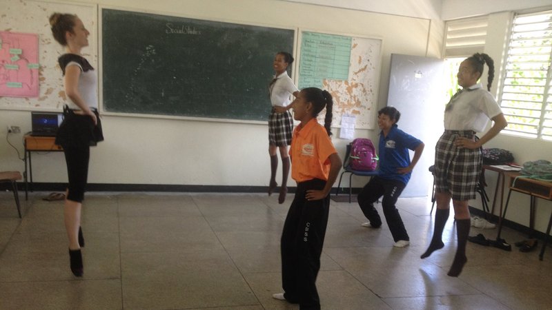 Teaching my students to "saute" at a ballet class.