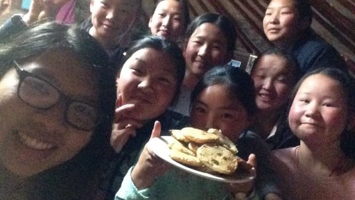 Learning how to make cookies in English club.