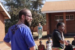 Cody helping at a camp