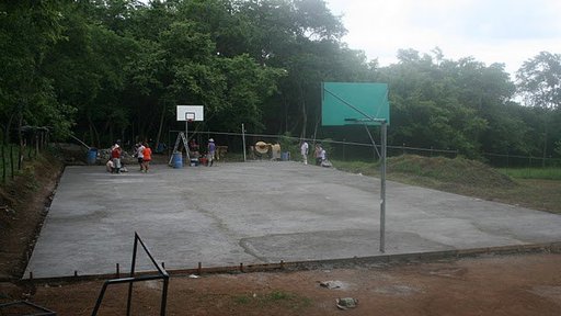 Completed multi-use court the community built with support from the high school, 50+ local volunteers and a group of 20 Courts for Kids volunteers from my hometown.