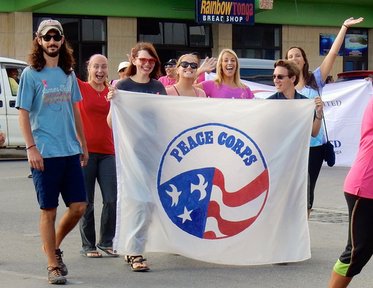 Group 80 Volunteers marching at Breast Cancer Awareness Parade, October 2015