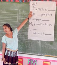 Trainee practices simple grammatical constructions in Model School during Pre-Service Training