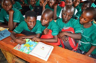 Pupils read a book on DEAR Day.JPG