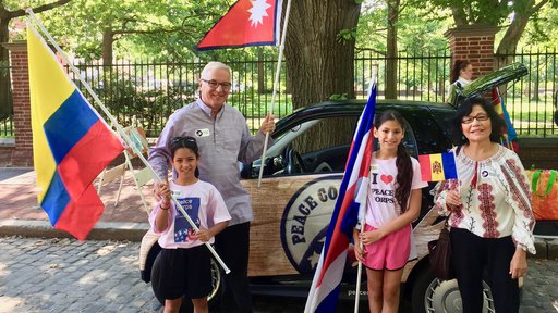 Older American man and woman with their grandchildren.