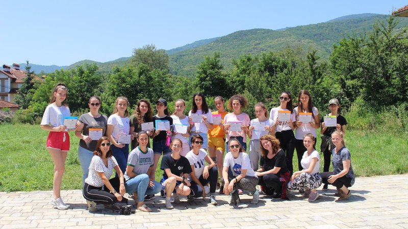 GLOW participants receive their completion certificates at the end of the camp