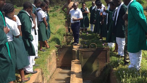 Community health nursing students visiting a sewage facility in Mzuzu, Malawi. These are first-year nursing students at St. John of God College of Health Sciences, where GHSP Volunteers are teaching.