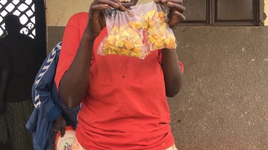 Participant showing off her packaged sweet potato chips