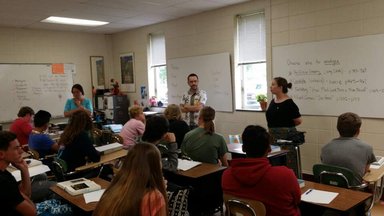 Rachel and Evan speaks to a class at Rachel's old high school, which is also her partner school with World Wise Schools