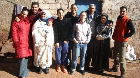 JK (5th from left) and Amanda (6th from left) with their phenomenal host family in Morocco.