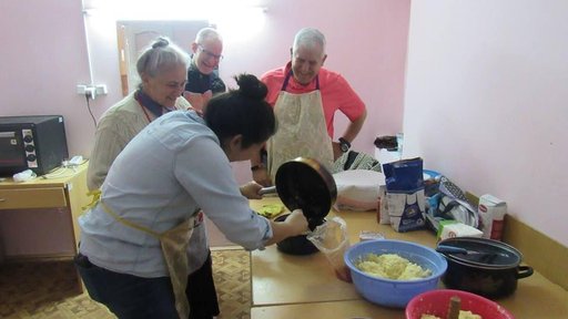 Some Volunteers learning how to make khachapuri (cheese-filled dough) and lobiani (bean-filled dough).