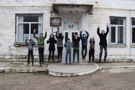 Local kids (and their Volunteer) participate in the #PeaceCorpsLeap.