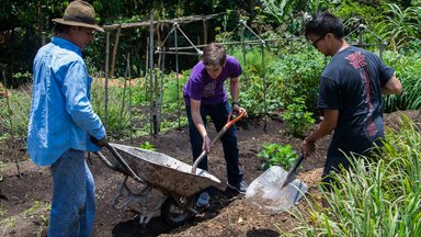 Luis with vols in garden 2016