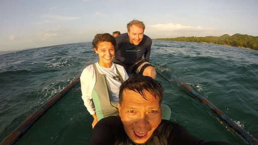 Morgan travels by boat to perform surveys of the local marine protected areas, with her coworkers Drew Sullivan (back, fellow