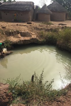 Children collect water for cooking, drinking and bathing from a local river.