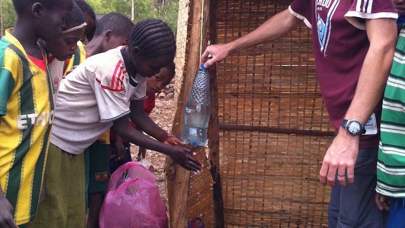 Ethiopia: Volunteer leads a hygiene activity highlighting the importance of handwashing.