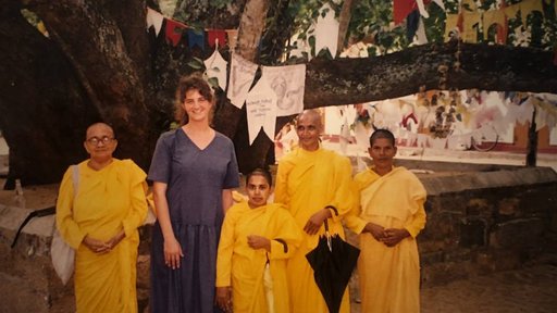 Peace Corps Volunteer with lady Buddhist monks