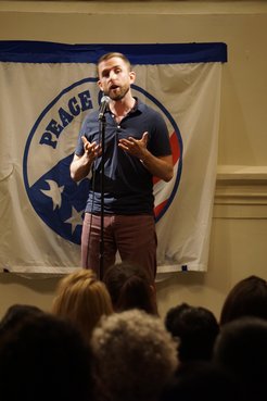 Jason tells a story at the 7th Annual RPCV Story Slam.