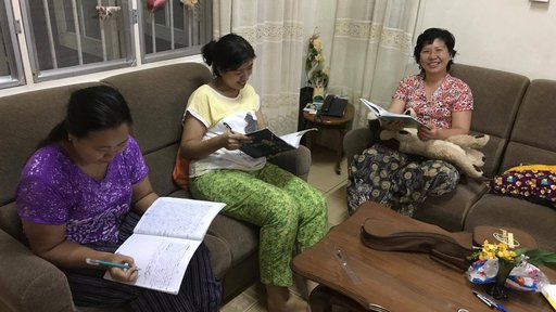Host mom and sisters reading grammar and phrase books!