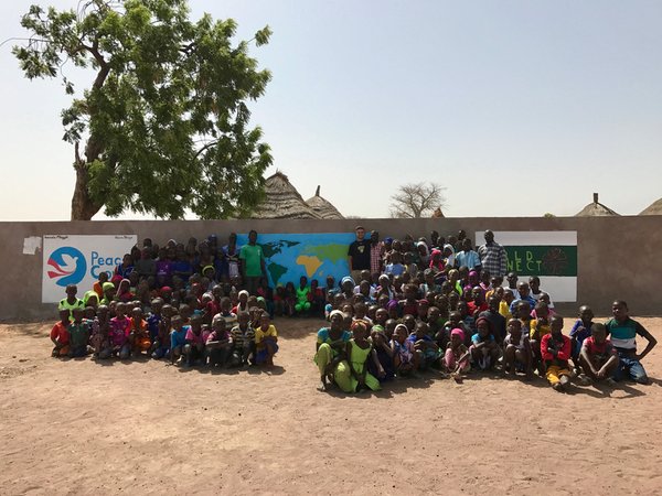 Students, teachers and PCV Michael.jpg