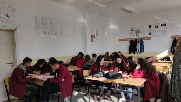 Students working hard on their group assessments