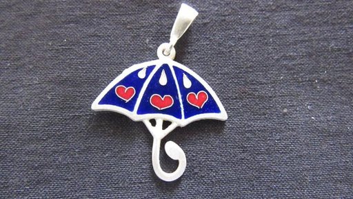Traditional enamel jewelry made at the social enterprise
